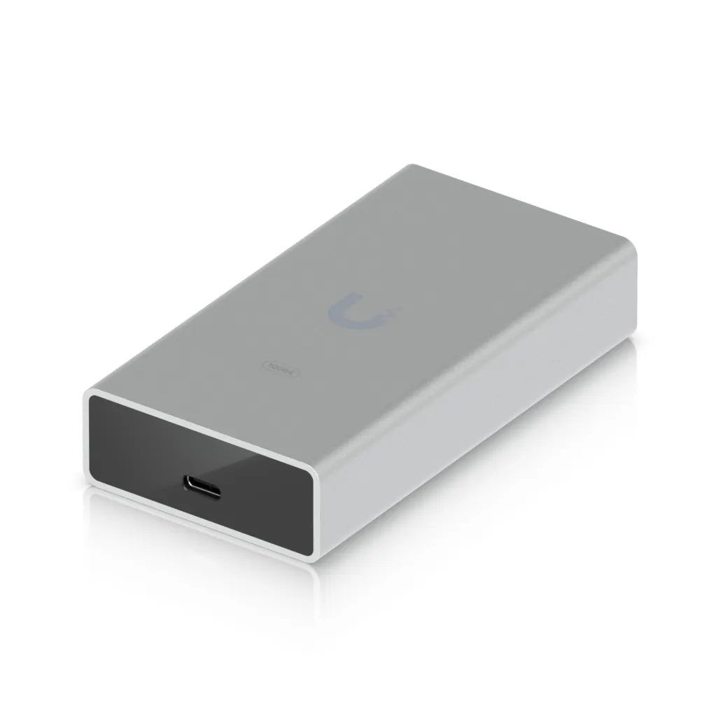 Mrežni adapter USB-C => LAN RJ45 10Gbp/s Ubiquiti (UACC-Adapter-RJ45-USBC-10GE) Mrežni adapter USB-C => LAN RJ45 10Gbp/s Ubiquiti (UACC-Adapter-RJ45-USBC-10GE)